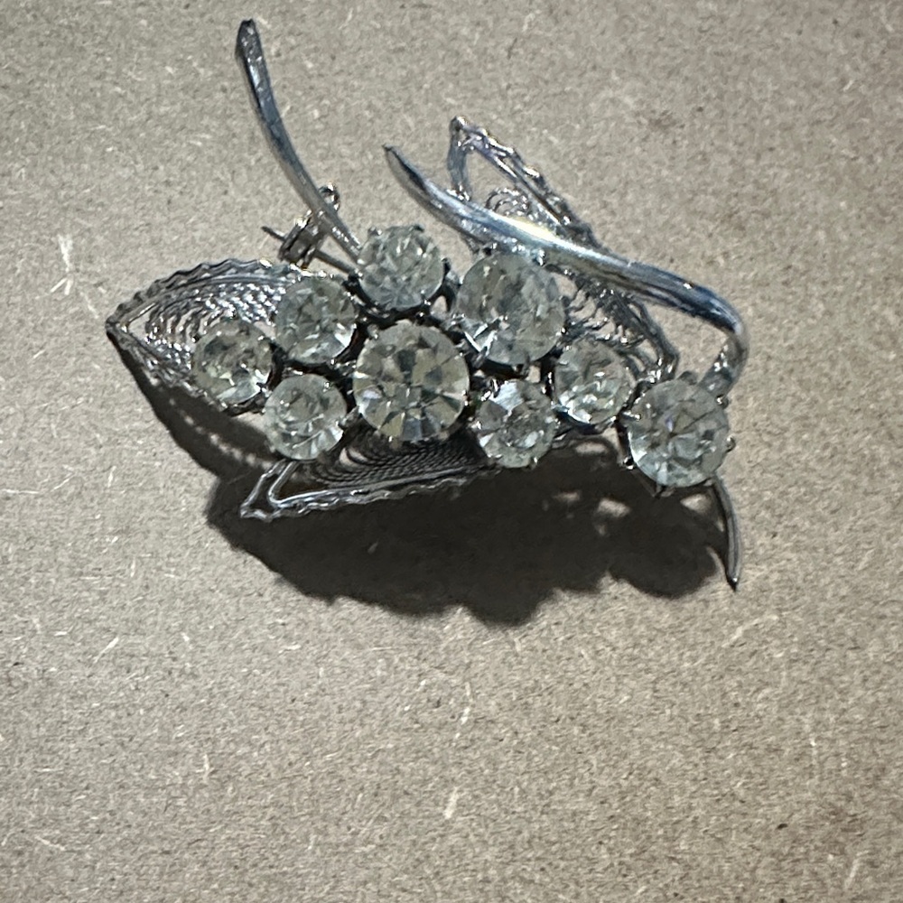 Elegant Silver Brooch with Clear Gems